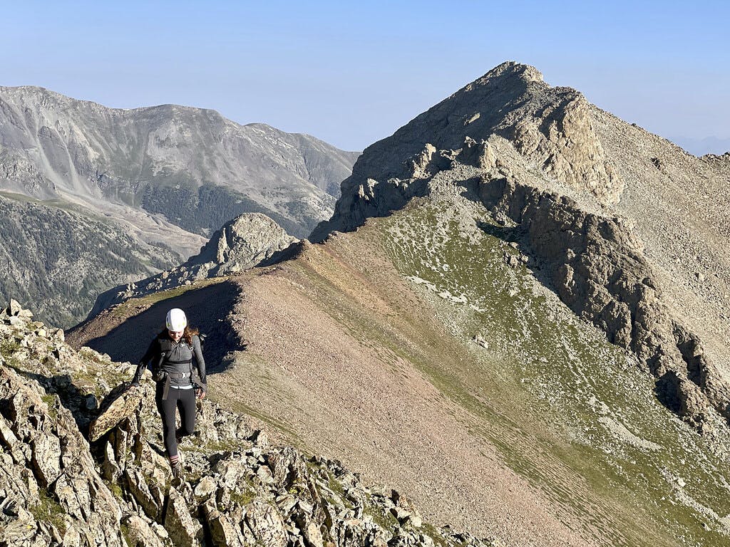 My climbing partner Ally moving along Mount Lindsey's lower ridge.